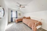 Upstairs bedroom with queen bed at Beach Walk